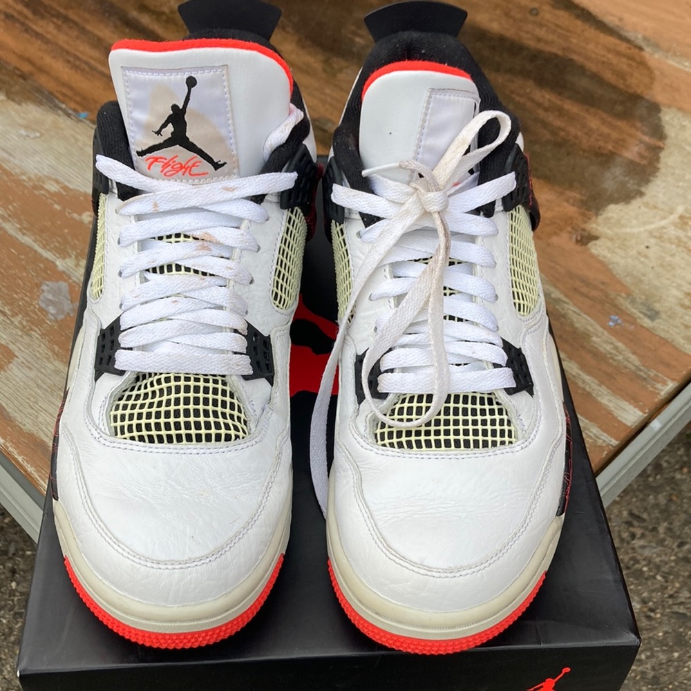 Used Air Jordan 4 Retro- white, black, and bright crimson-size 11.5